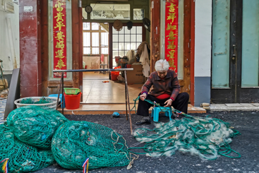《补渔网》