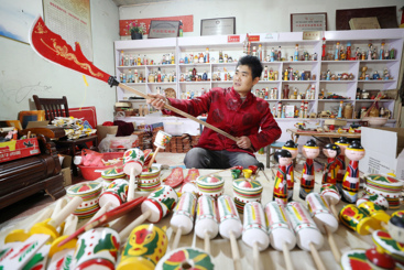 《木头旋出的“国家级非遗”》